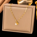 Elegant gold titanium steel necklace with white pearl and ginkgo leaf pendant - [H1087] Shell Pearl Gold