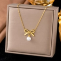 Elegant gold choker necklace featuring a delicate bow pendant and a single white pearl - [H351] Bow Pearl Necklace Gold