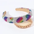Detail showing high crown padded headband with sparkling rhinestones and rainbow heart accents - White Rainbow Heart