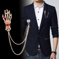 Gold skeleton hand suit brooch with red rhinestones and hanging double chains - Gold Hand Bone with Chain