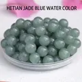 Macro detail of natural blue Hetian jade round beads for DIY jewelry making and bracelets - Hotan Blue Water / 8mm