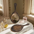 Vintage bronze handheld makeup mirror with intricate baroque embossed floral patterns - 11.5*25cm / Bronze