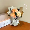 Three orange soap flower carnations bouquet with baby's breath in green wrapping - Champagne Yellow Carnation (3076-11)