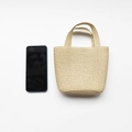 Mini beige straw handbag for girls shown next to a mobile phone for size reference - Beige Handbag (20*15cm)