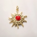 Close-up of gold-plated sun pendant with a glossy red center for jewelry making - Red Enamel Sun (A880)
