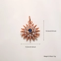 Detail of rose gold sunburst pendant with blue gemstone and dimensions 15.5mm x 13.3mm - Rose Gold Zirconia Sun (A883)
