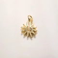 Detailed macro view of the 18k gold plated sun pendant with radiant rays and jump ring - Gold Shiny Small Sun (A890)