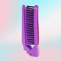 Dettaglio del pettine pieghevole viola che mostra il design compatto e i denti neri - Viola