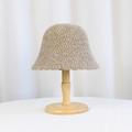 Beige knitted bucket hat with diamond texture on a wooden stand for winter warmth - Crochet Hollow Wavy Brim (8980) / Mocha