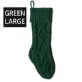 Large green Christmas knitted stocking featuring a cable knit pattern and hanging loop - Green