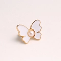 Elegant butterfly waist adjuster pin with white enamel wings and a pearl accent - White Pearl Butterfly