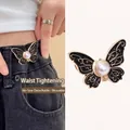 Adjustable black butterfly waist buckle with gold trim and pearl for denim pants - Patterned Black Pearl Butterfly