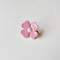 Pink heart-shaped flower waist adjuster with gold trim and white pearl center - Clover Pink