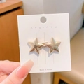 Star shaped adjustable alloy waist buckle in gold finish on a display card - Gold Star Waist Buckle