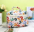 Quilted cotton cosmetic bag with abstract geometric patterns and top handle strap - Colorful U-Pattern