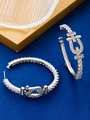 Silver horsebit hoop earrings with shimmering crystals and elegant C-shaped buckle design - Silver