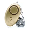 Portable personal self-defense panic alarm with golden finish and LED flashlight - Gold