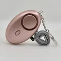 Portable rose gold personal security alarm with matte finish and steel keychain loop - Rose Gold