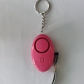 Pink personal safety alarm for women with LED light, keychain and wrist strap - Rose Red