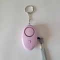 Pink personal safety alarm for women with metal keychain and grey wrist strap - Purple