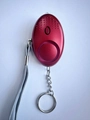 Compact red metallic personal alarm with LED light, key ring and durable gray lanyard - Burgundy