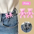 Pink and silver bear-shaped waist adjusters for jeans showing easy detachable installation - Pink