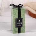 Scented pillar candle in green marble texture with elegant black ribbon bow decoration - Green - Apple