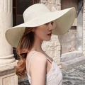 White wide-brim straw beach hat with elegant tulle bow detail for summer sun protection - One Size / Milk White