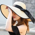 Women's wide brim straw sun hat in cream with elegant black ribbon bow detail - One Size / Beige with Black Border