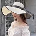 Elegant wide brim straw sun hat in cream white with black ribbon and contrast piping - One Size / Milk White with Black Border