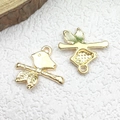 Gold bird on branch pendant charms with leaf texture details and shiny metallic finish - 1pc Bird on Treetop Charm