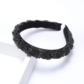 Retro black headband featuring twisted braid design with shimmering micro rhinestones - Black