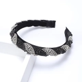 Twisted rhinestone headband with black and white crystals in a braided vintage design - Black and White
