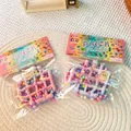 Detalle de juguetes squishy de gofres macaron con cuentas de colores y empaque individual - Card Head PVC Bag / Waffle Multicolor
