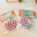 Detail of macaron gradient waffle squishy toys with colorful beads in pinch family packaging - Card Head PVC Bag / Waffle Multicolor