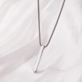 Polished stainless steel rectangular bar pendant necklace on elegant white silk background - Silver 5mm (117418)