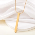 Polished gold rectangular bar pendant necklace on a sleek snake chain and white background - Gold 4mm (207110)