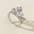 Detail of silver crown ring featuring a pink square zircon and micro-pave setting - Style 16