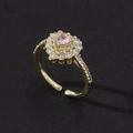 Detail of gold open ring featuring pink heart zircon and double-layer pavé setting - Style 19