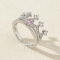 Elegant silver crown ring with pear-shaped pink stone and cubic zirconia accents - Style 22