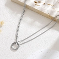 Minimalist silver double-layer stainless steel necklace with round pendant on stone surface - Ring Necklace Steel Color (X1374)
