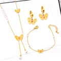 Gold butterfly jewelry set with pearls and purple crystals featuring necklace and earrings - Pearl Butterfly Jewelry Set