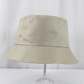 Detailed view of beige polyester bucket hat with reinforced brim stitching and twill weave - 58cm One Size / Khaki