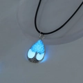 Luminous water drop pendant with tree of life design and blue glow on black cord - Blue-Green Tree of Life (NY954)