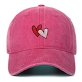 Macro detail of embroidered heart patterns on a washed pink cotton baseball cap - Adjustable / Rose Red