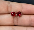 Red cubic zirconia stud earrings with classic six-prong setting in silver finish - Red Rhinestone
