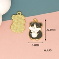 Detail of hamster enamel charm showing 22.5mm x 14mm size and golden back texture - Hamster(9)