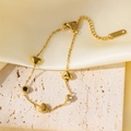 Elegant gold stainless steel heart charm bracelet with crystal accents on silk fabric - Black White CZ Heart / Gold
