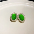 Macro shot of vintage emerald earrings with crystal halo on ceramic display tray - Halo Cabochon (36# Silver Earring Post)