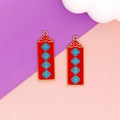 Detailed macro shot of Chinese style red enamel charms with auspicious Peace and Joy text - Peace and Joy-Double Sided